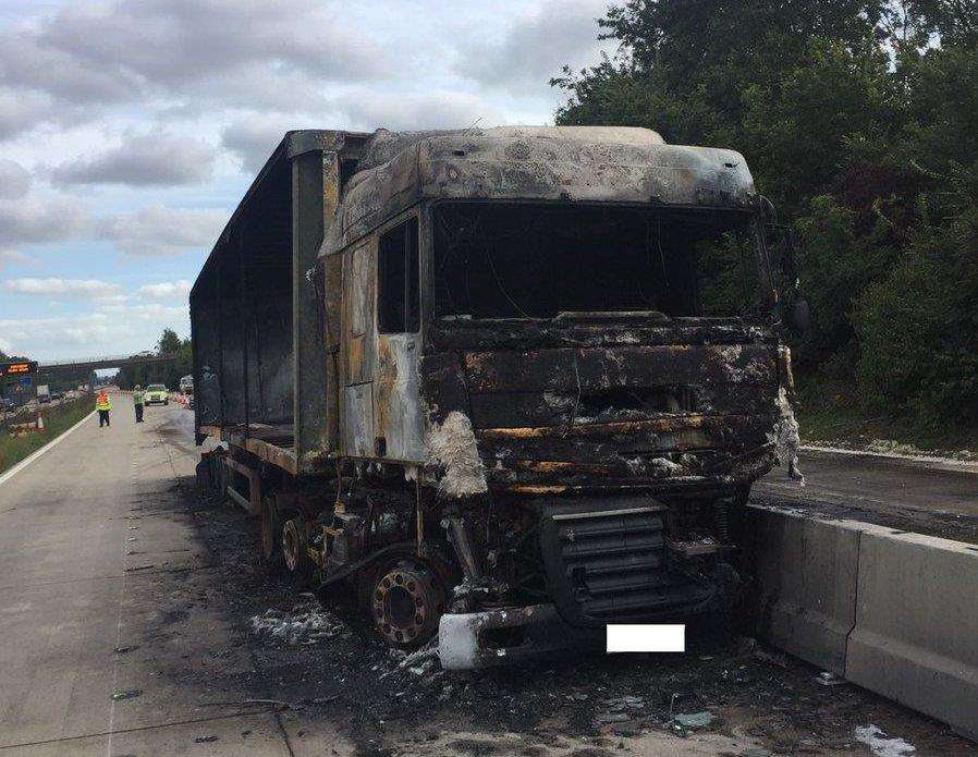 The remains of the fire-damaged lorry. Picture: Highways England
