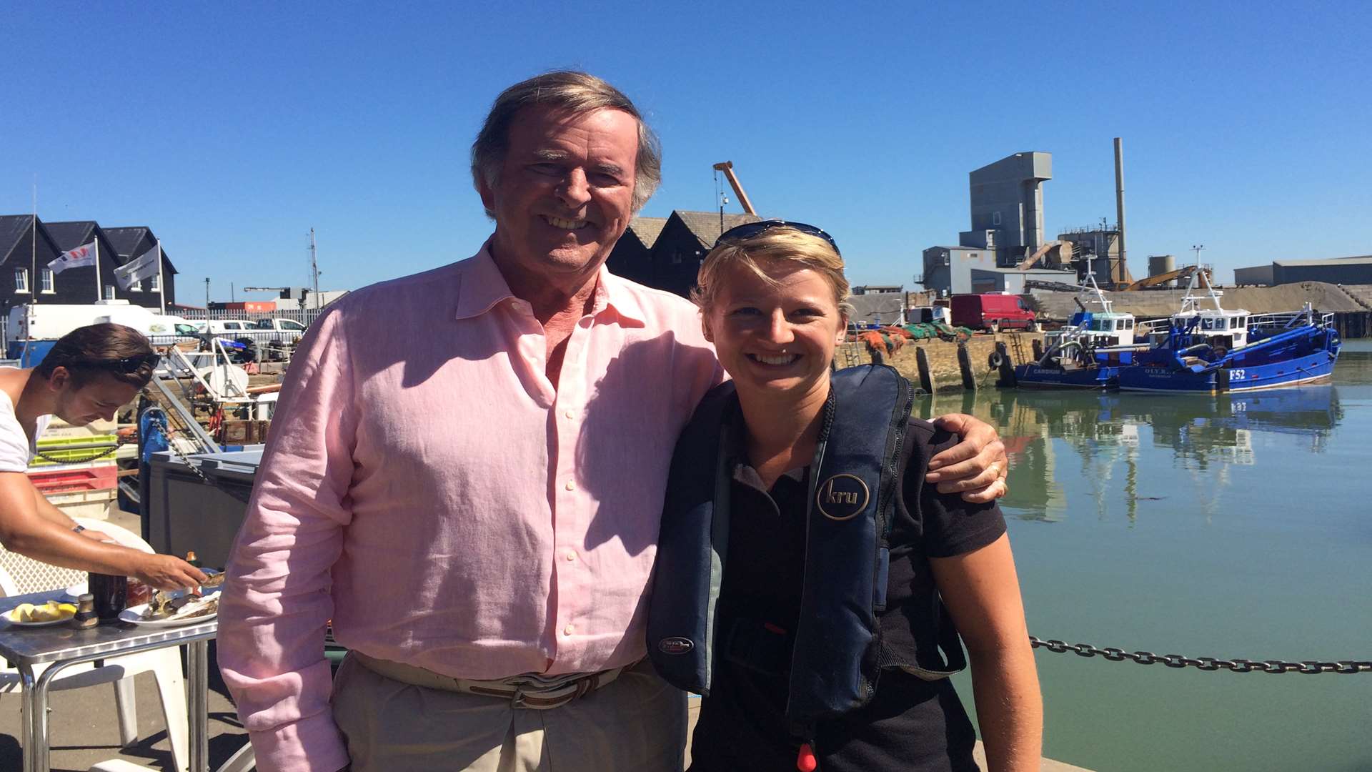 Irish entertainer Terry Wogan pictured at Whitstable Harbour with Angharad Purcell from Kent and Essex Inshore Fisheries and Conservation Authority
