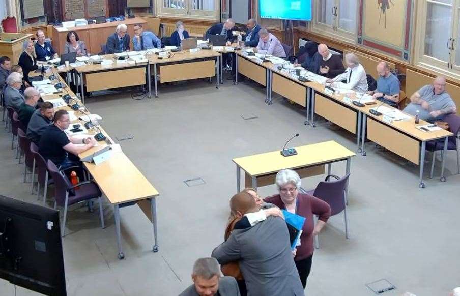 Cllr Lottie Parfitt-Reid and Adam Francis celebrate with a hug after the application was passed