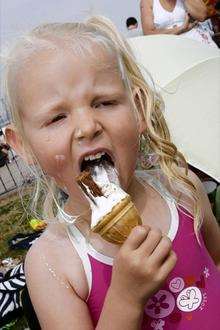 Selina Robbins, three, tucks into an ice cream at The Strand.