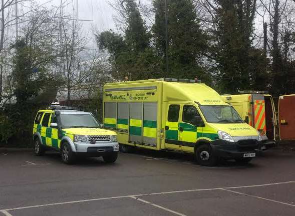 Ambulance teams parked near the river during the search