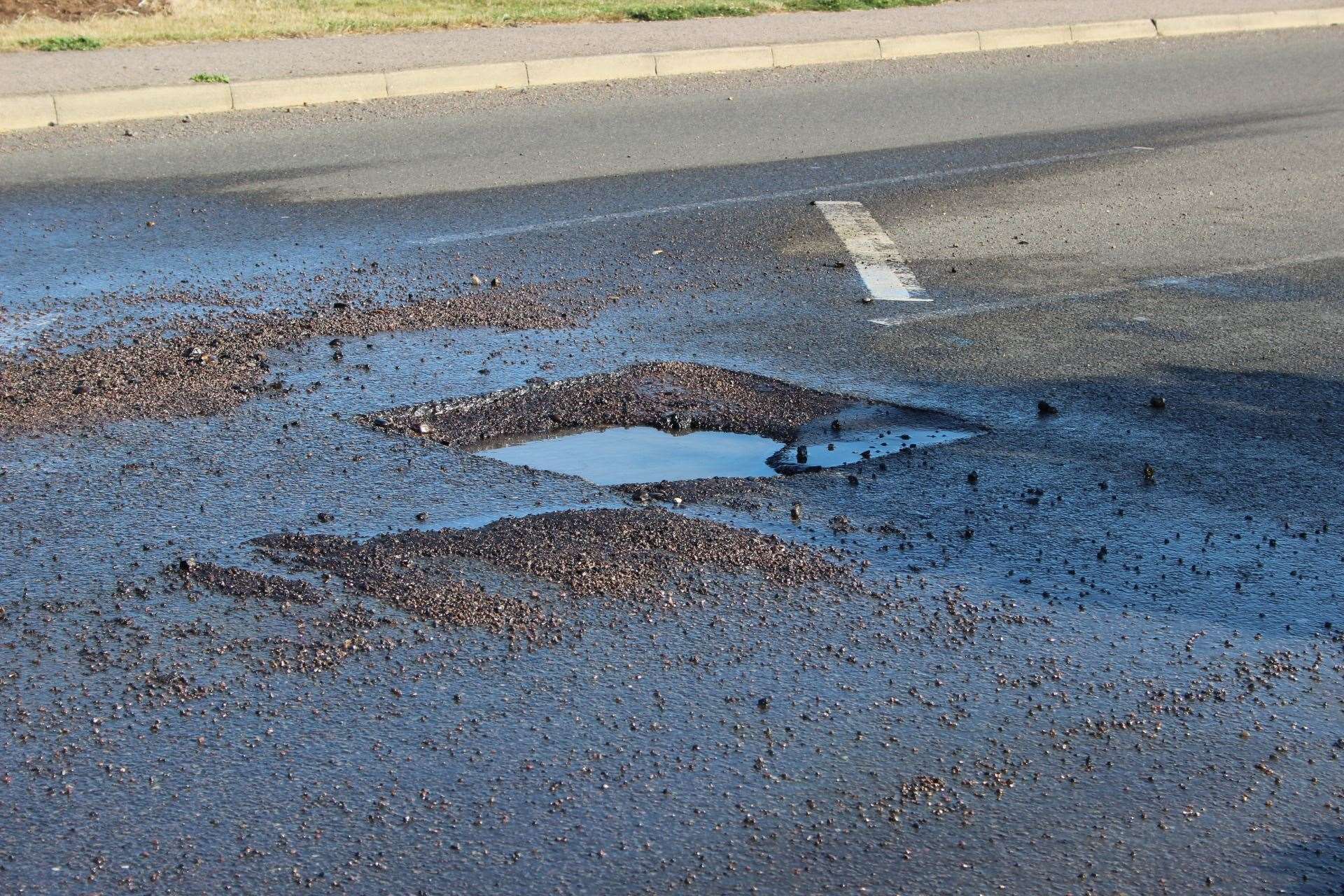 Dangerous pothole caused by a water leak in The Broadway, Minster, near the Abbey Motel (14923926)