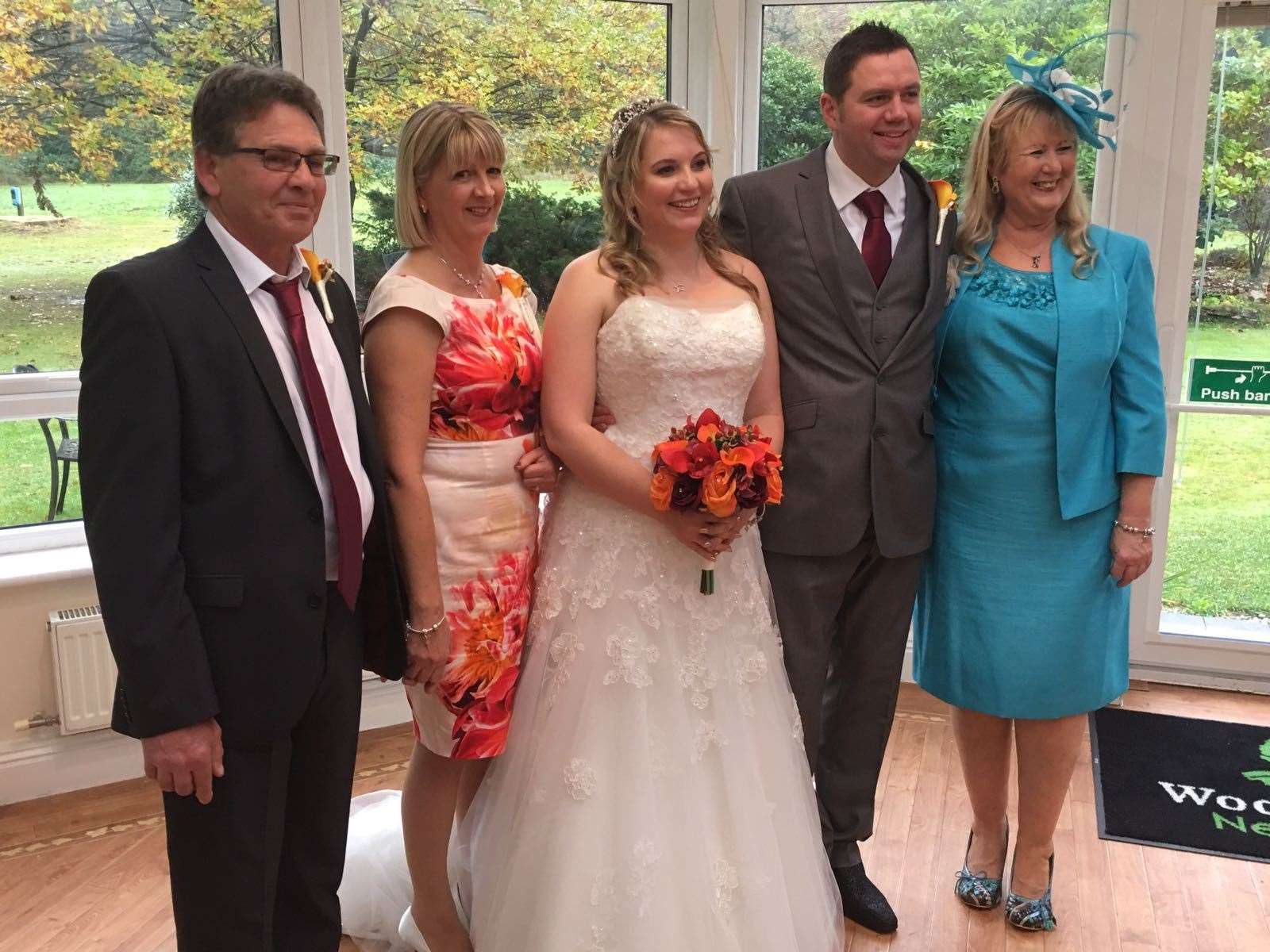 Sarah and Jeff Brown with their parents on their wedding day in 2016
