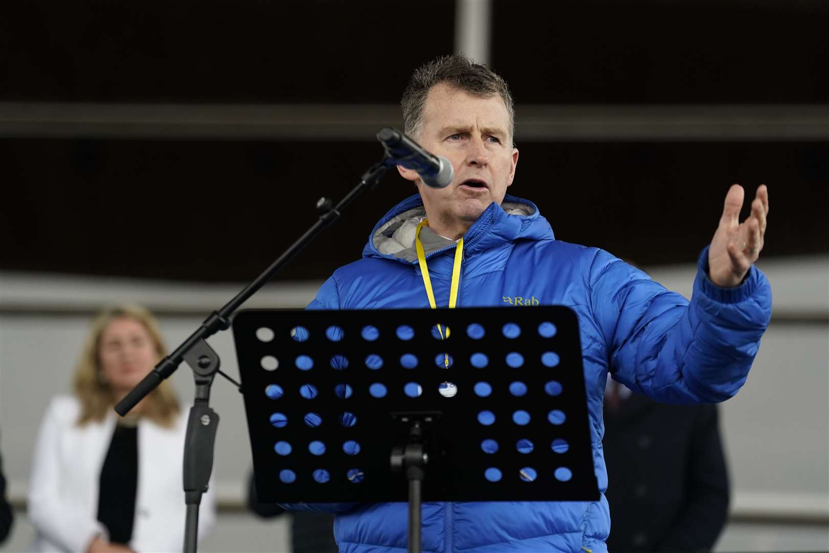 Former rugby union referee Nigel Owens addresses protesters in front of the Senedd (Andrew Matthews/PA)