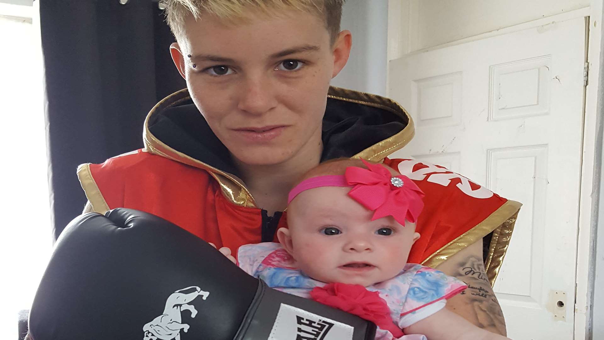 Boxing mum Kiya Mills with daughter Miracle