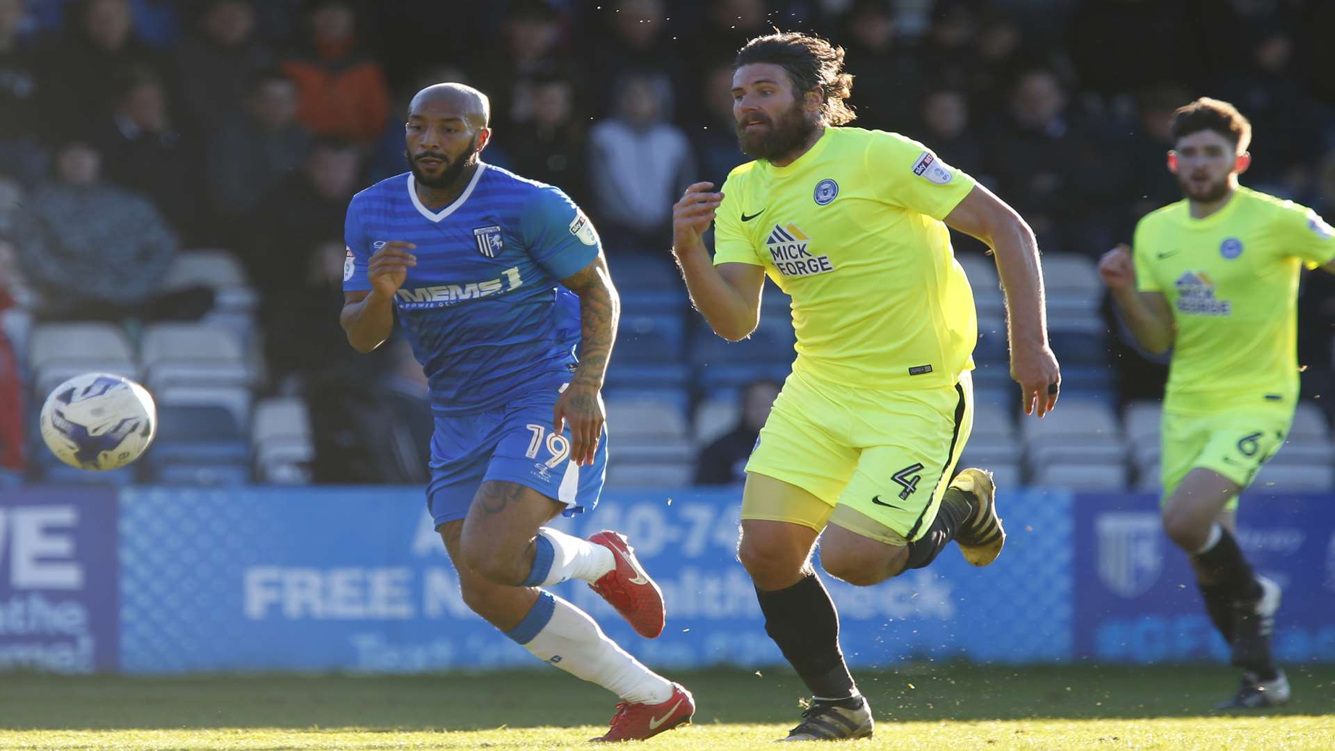 Gills striker Josh Parker in a race for the ball Picture: Andy Jones