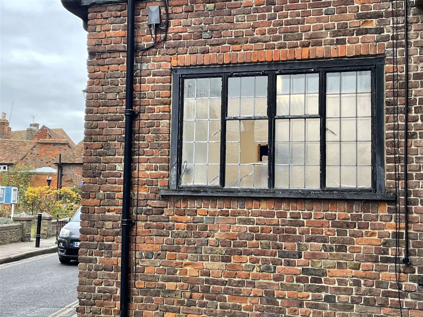 A broken window at Sandwich Guildhall, pictured on November 16
