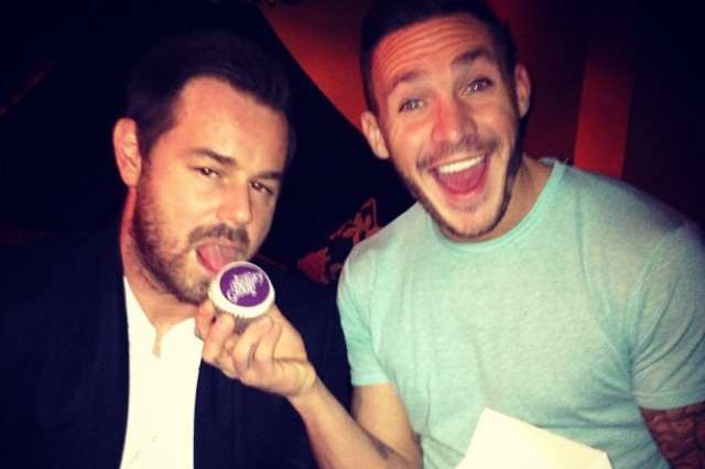 Danny Dyer enjoys a Heavenly Tiers cupcake