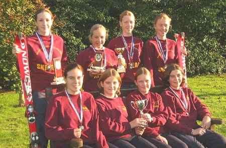 POLE POSITION: Pictured with their medals and trophies won this year at the Kent Schools' and English Schools' ski races are from left, back, Charlotte Owen, Rachael Underwood, Alice Limb, Emily Limb; front, Sian Williams, Caroline Hamilton, Marianne Rolph, Katie Hamilton. Picture: BRIDGET OWEN