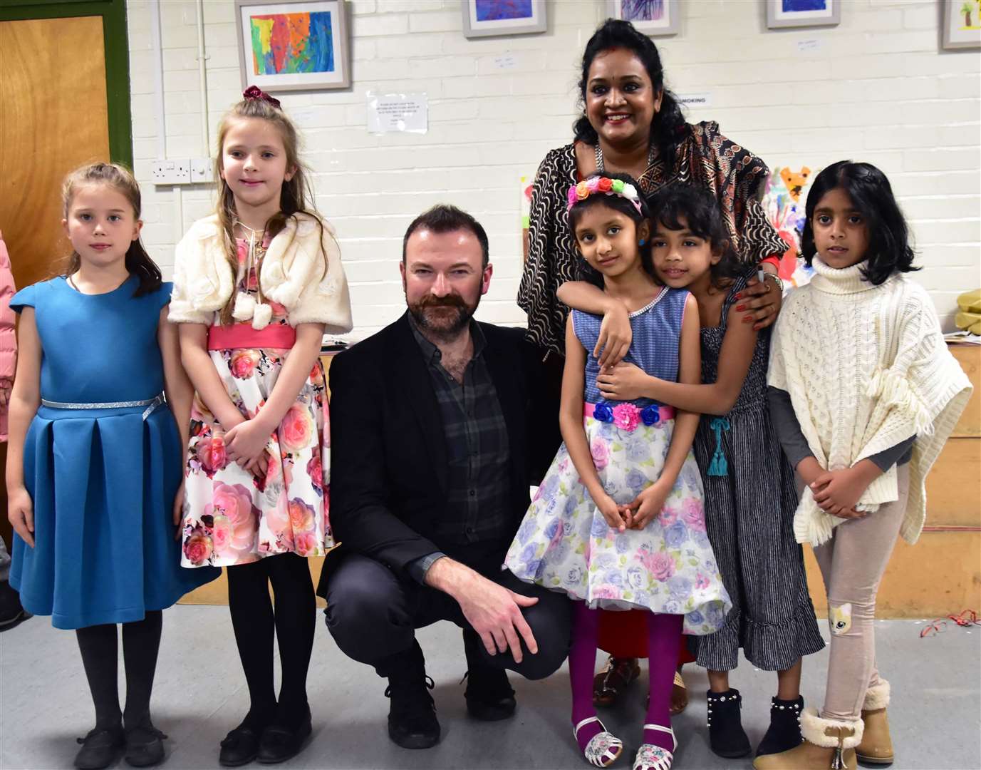 Meenatchi Gopal and Alex Patterson with the children of Gochi Academy Picture: Selin George