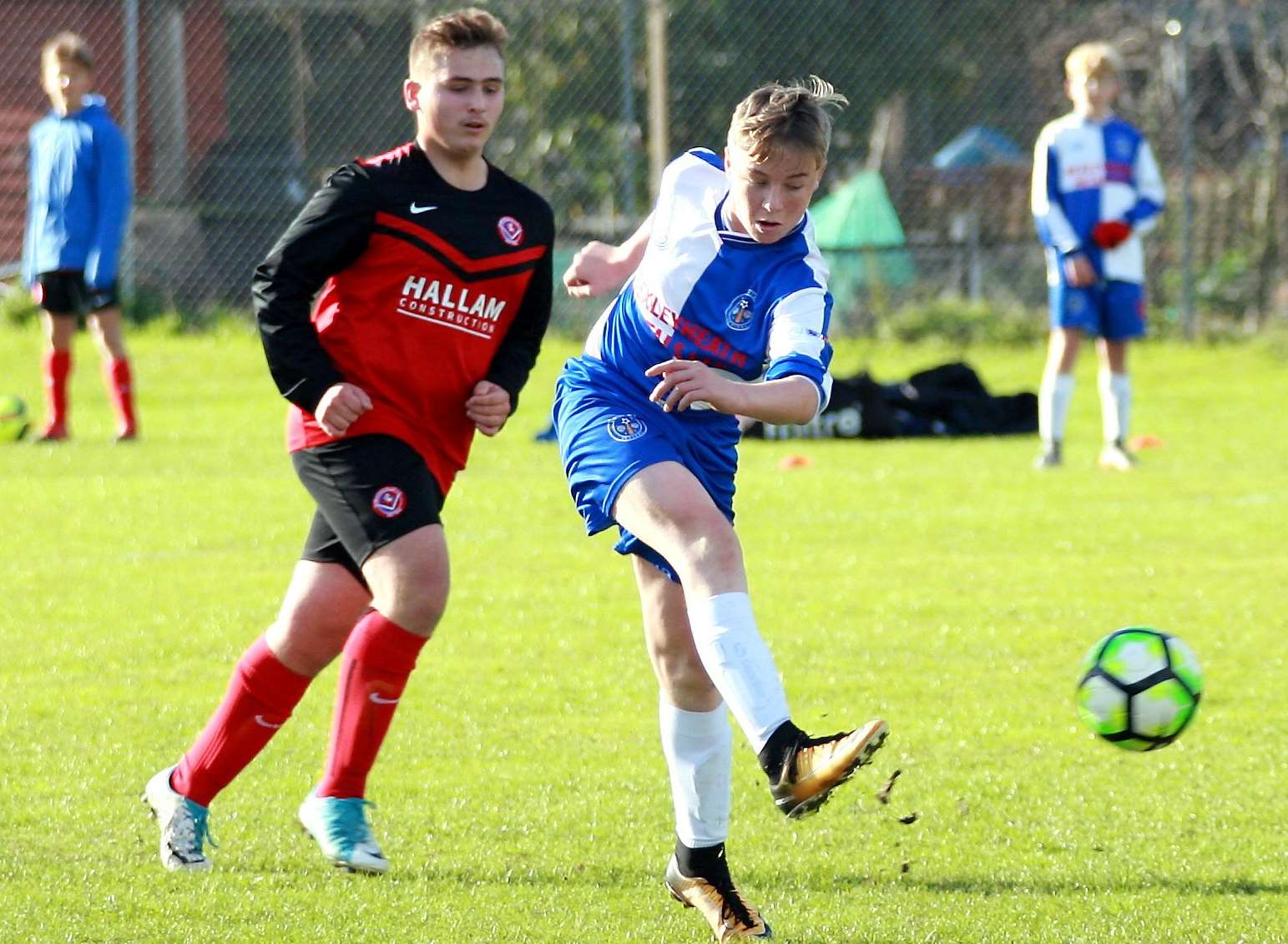 Bredhurst Juniors Youth (blue) under-15s let fly against Hempstead Valley under-15s. Picture: Phil Lee FM4981522