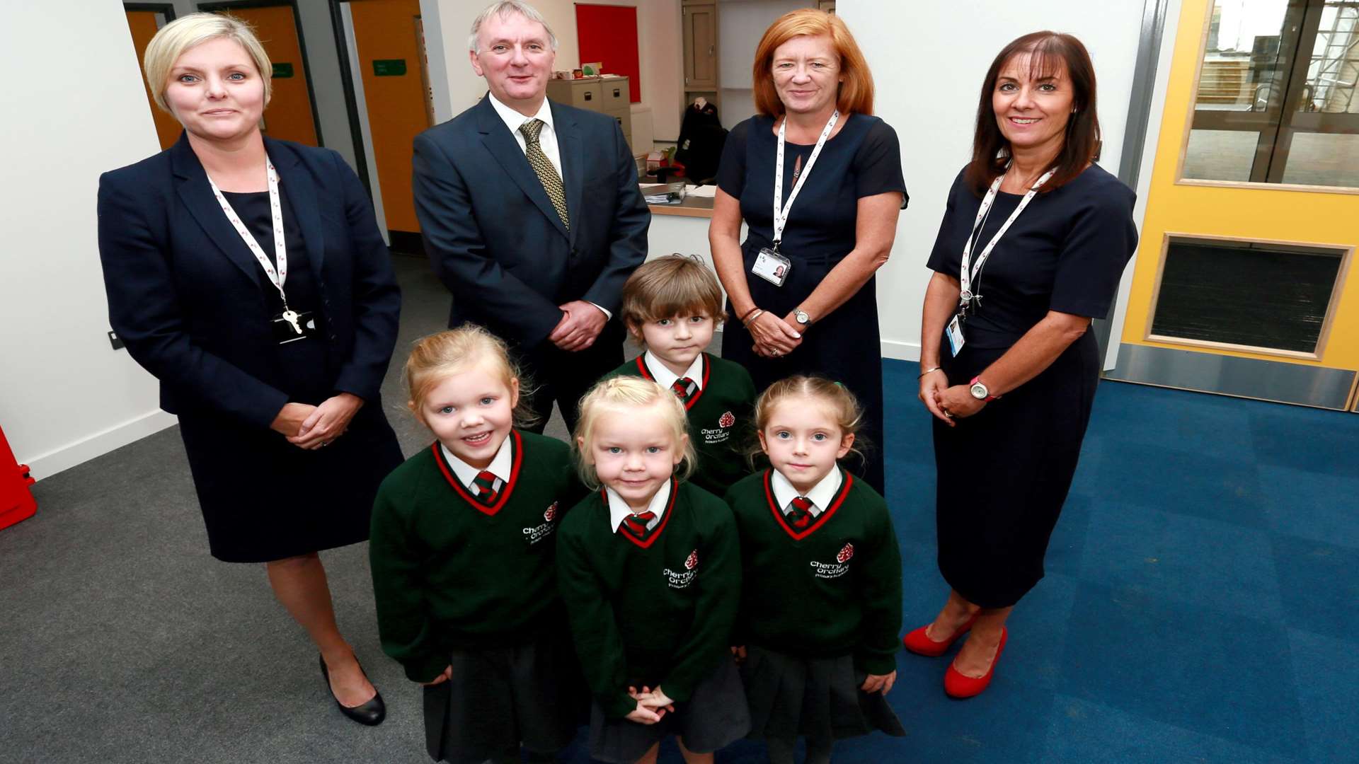 Principal Julie Forsythe, deputy CEO Neil Willis, business manager Jo Allen and office manager Claire Bond with Cherry Orchard pupils Sophie Whelan, Dolly-Mae De Ste Croix, Teddy Young and Daisy Russell. Picture: Phil Lee