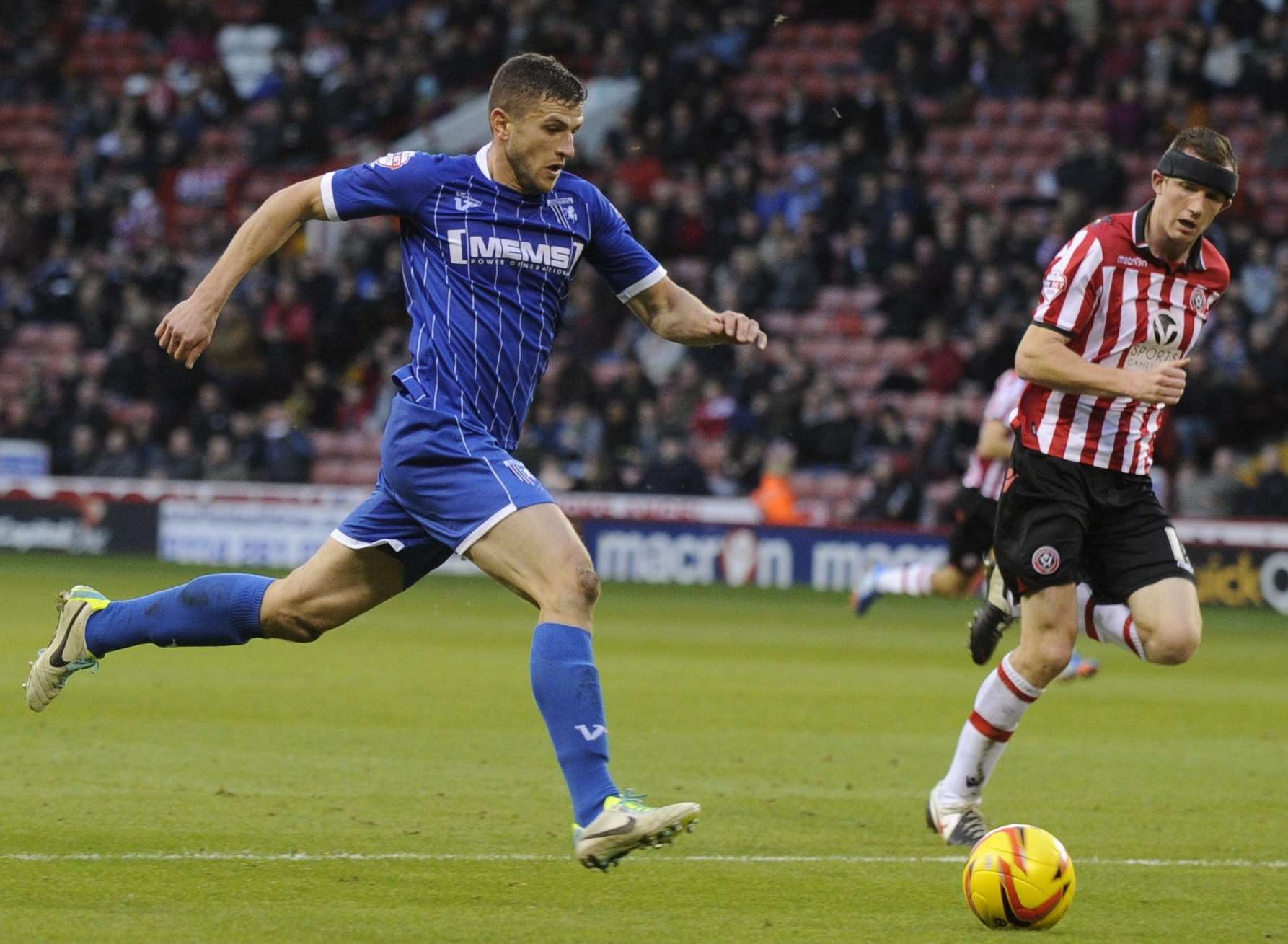 John Mousinho in action for Gillingham against Sheffield United in November 2013. Picture; Barry Goodwin