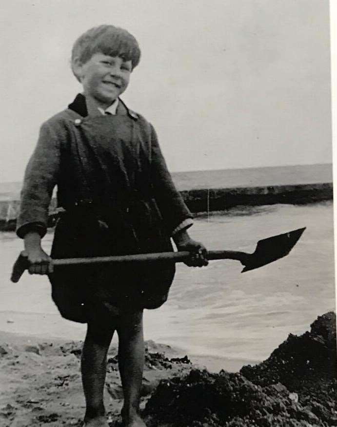 David King as a young boy enjoying a day on the beach