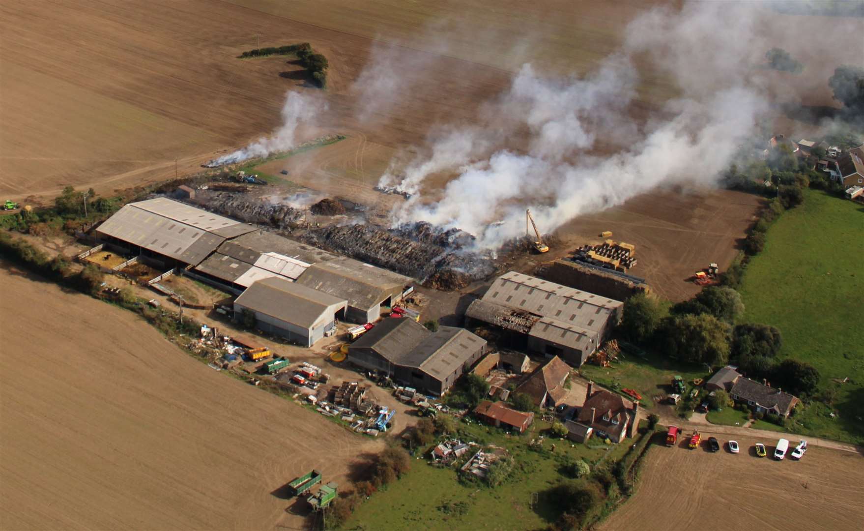 The recent fire at Elmtree Farm in Sellindge in late September. Hundreds of cows had to be rushed to safety and the blaze burnt for days. Picture: Geoff Hall