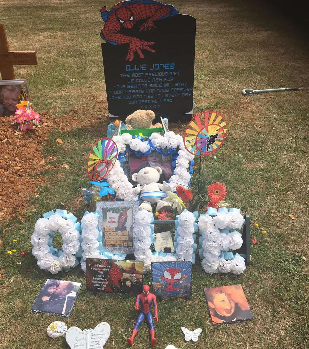 Lloyd Jones put up a temporary Spider-Man marker at his son Ollie's grave in Maidstone