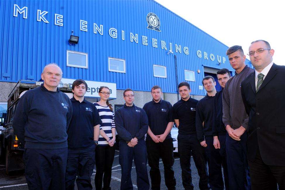 Apprentices at MKE Electrical with Trevor Rootes, far left, one of the firm's first apprentices, and far right, operations manager Shaun Stickings