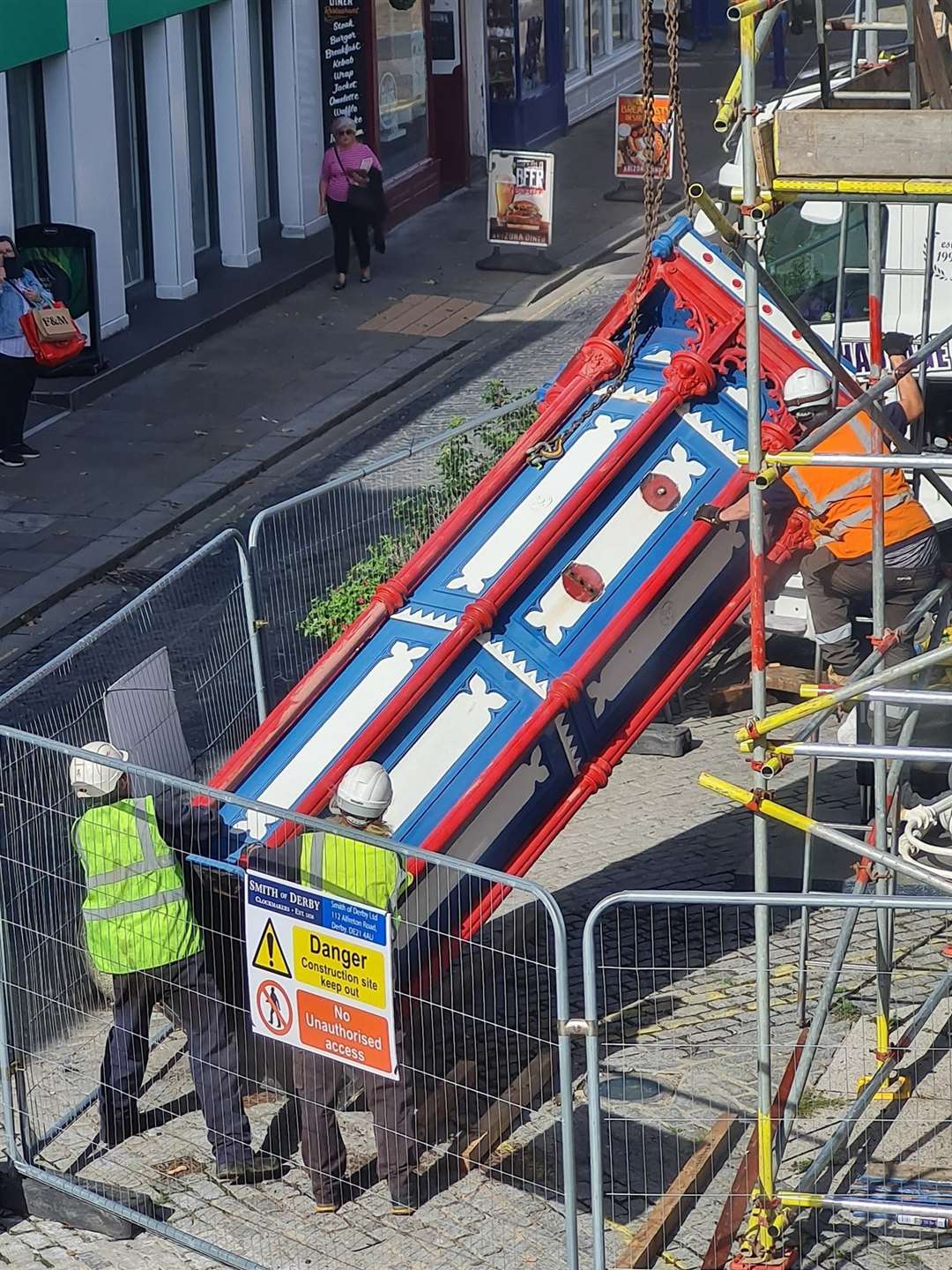 Day two: Engineers from Smith of Derby use a crane to remove the 119-year-old Sheerness clock tower. It will be taken away for a full restoration. Picture: Donna Mansi
