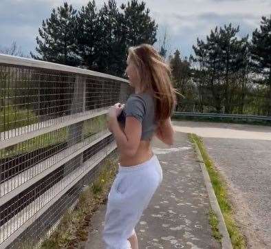 Billie Louise flashes her breasts on the bridge. Picture: Twitter