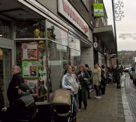 Customers queue outside Woolworths, Strood on Thursday morning