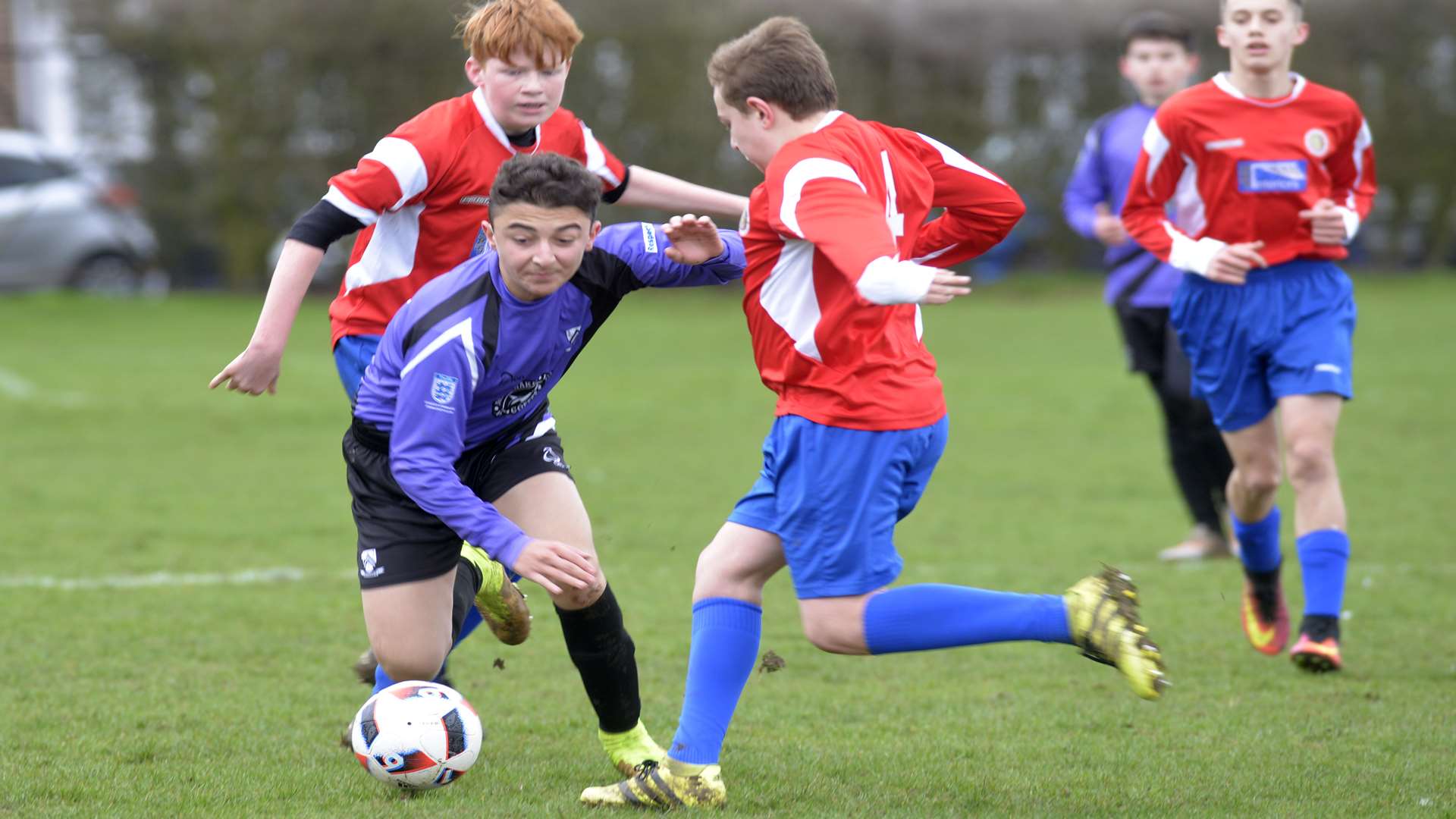Anchorians United (purple) and Woodpecker HI fight for points in Under-15 Division 2 Picture: Ruth Cuerden
