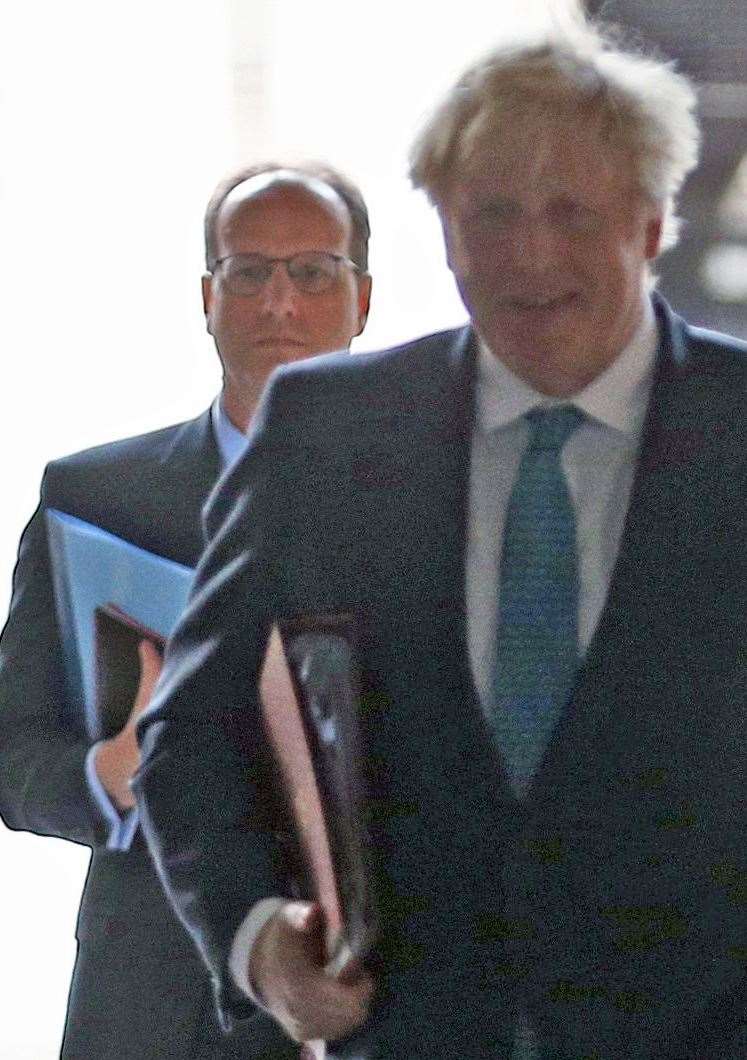 Boris Johnson followed by his principal private secretary, Martin Reynolds (Yui Mok/PA)