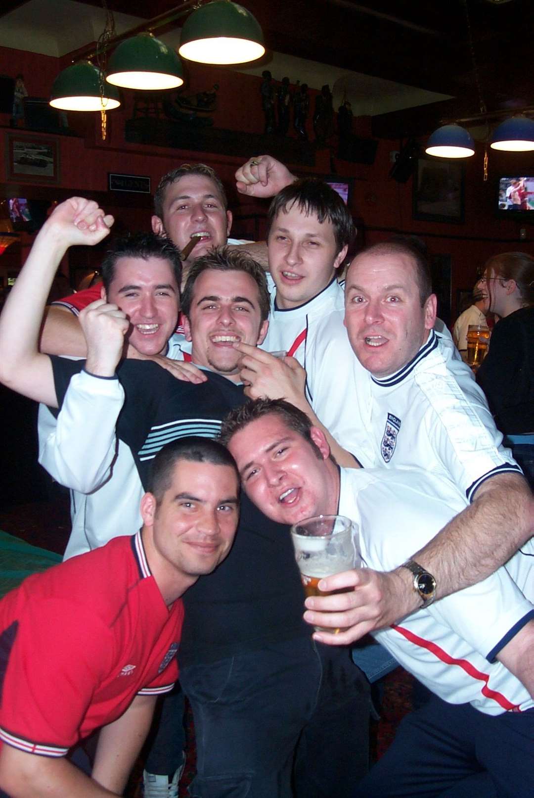 Fans in the Railway Hotel, Dartford, celebrate after England's 3-0 win over Denmark in the 2002 World Cup