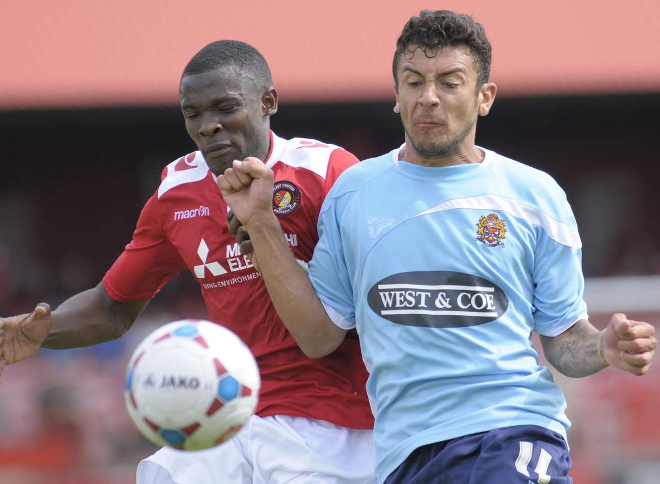 Anthony Cook tangles with Dagenham's George Porter Picture: Ruth Cuerden