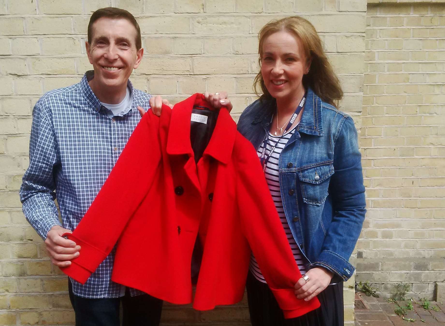 Radio presenter Erika North is trying to track down a lady who gave up her red coat to help her injured mother at the roadside. Picture: Erika North