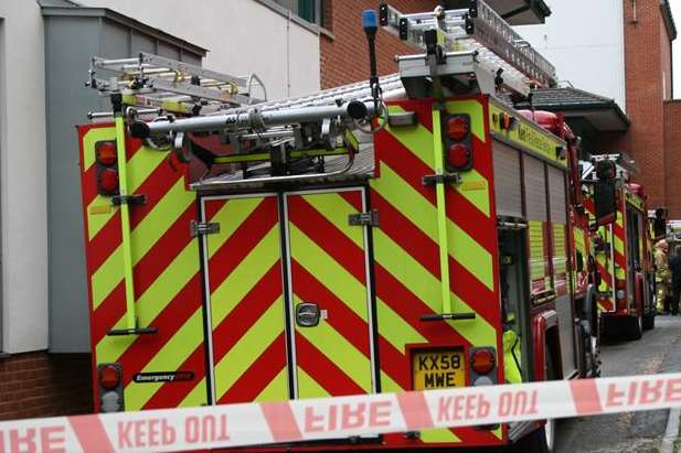 Fire crews were called to a blaze in three garages.