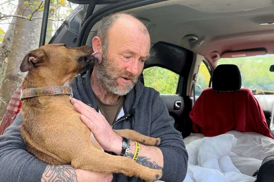Paul Growns with his dog Toby, who he rescued from the River Medway
