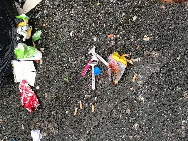 Razors are left on the pavement