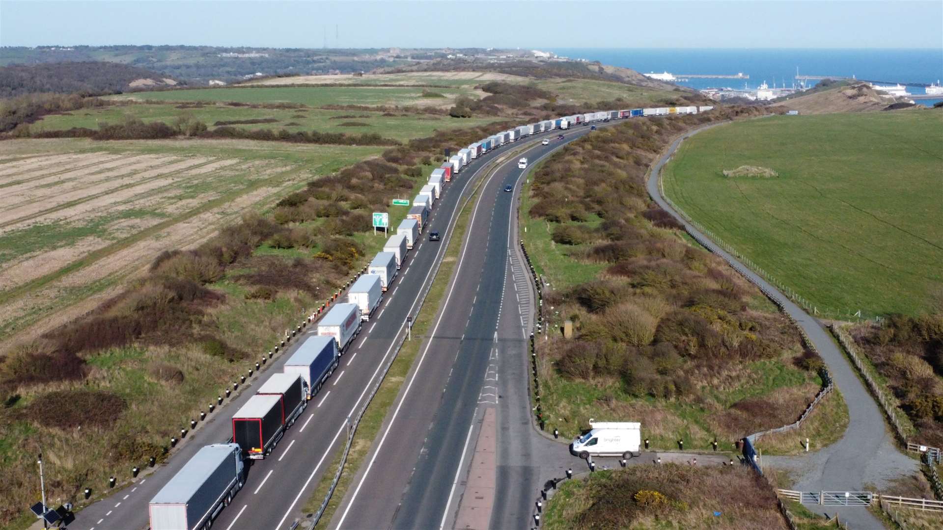 A long line of lorries wait on the A20 heading into Dover as P&O services remained in port Picture: Barry Goodwin