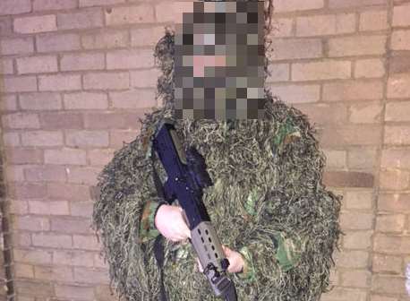 One of the men in camouflage gear heading to the Go Commando army fancy dress night.