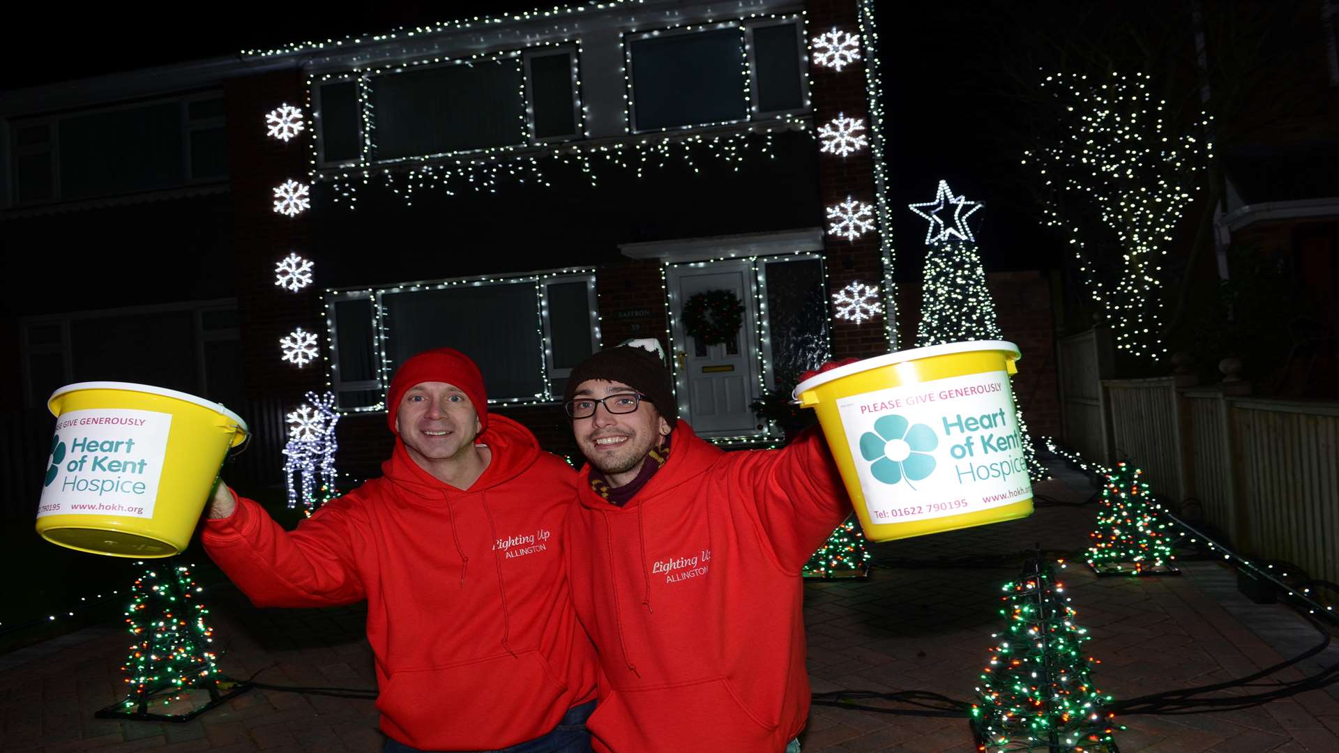 Stevie Adams and John Walker with their charity lights display last Christmas