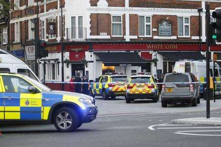 Police outside the White Lion pub in Chatham High Street