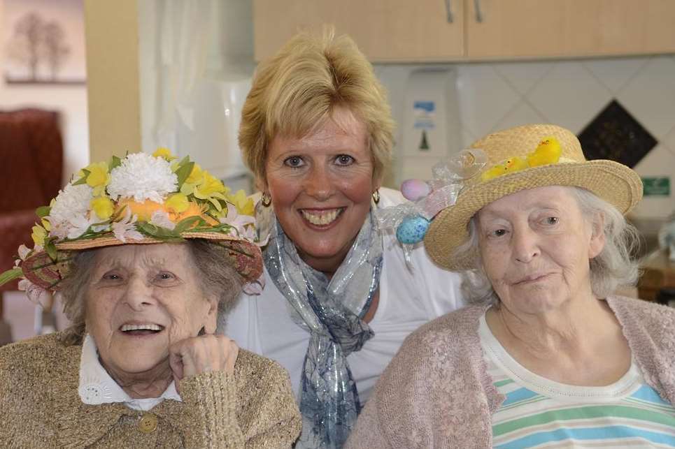 Residents Ella Daniels, 83 and Connie Mitchell, 79 with team leader Jane Ashington at the Easter bonnet parade held at the Wayfarers Care Home in Sandwich