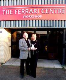 Roger and Claire Collingwood, owners of The Ferrari Centre in Maidstone, with the Independent Dealer Website Award for their site designed by GForces, Bearsted