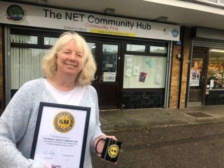 Jaye Nolan with her mug and certificate outside the site of Net Community Hub (21099602)