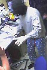 A CCTV image of one of the robbers wearing the pyjamas. Picture: Kent Police