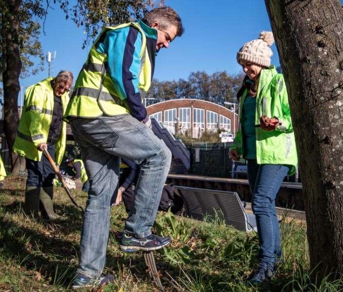 Planting flowers near a station is one of the ways volunteers help. Picture: Southeastern