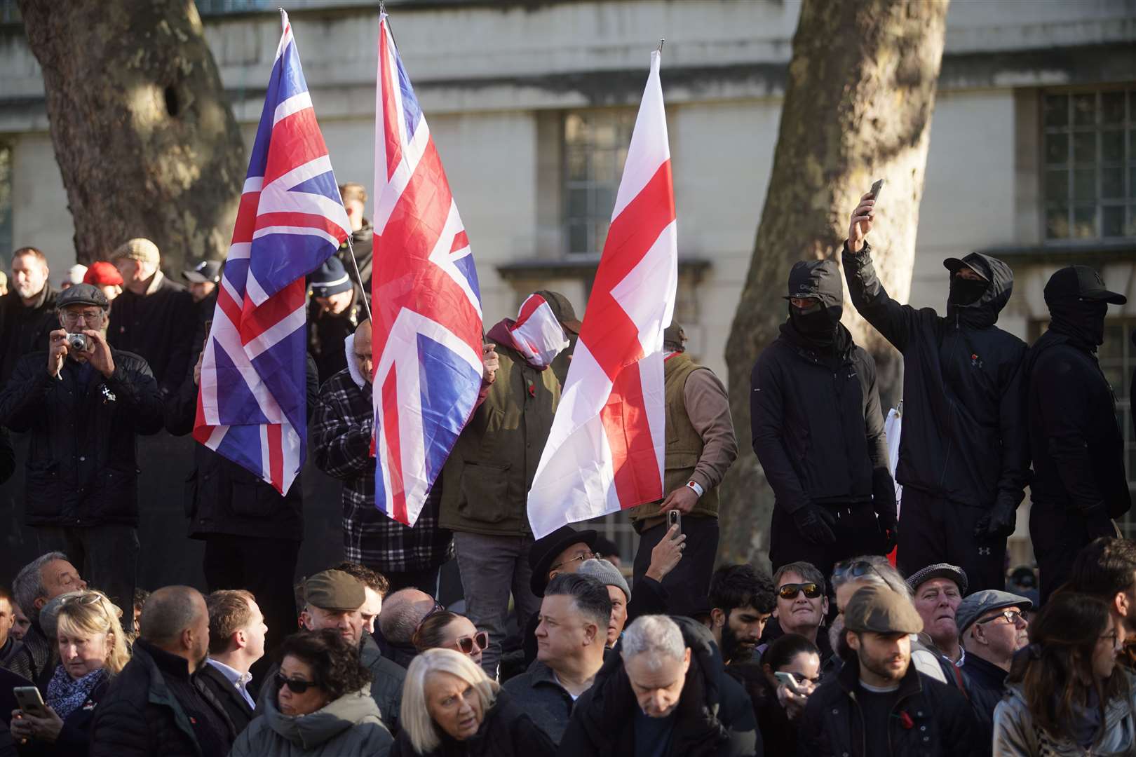 Some people waved Union flags and St George’s flags near the Cenotaph (Jeff Moore/PA)