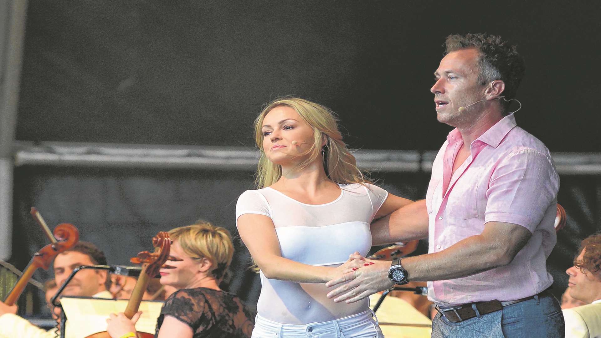 James and Ola Jordan lead the audience in a waltz