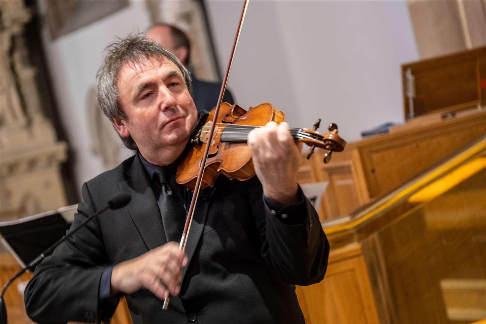 Frank Gallagher plays the violin during the service (Stephen Latimer/PA)