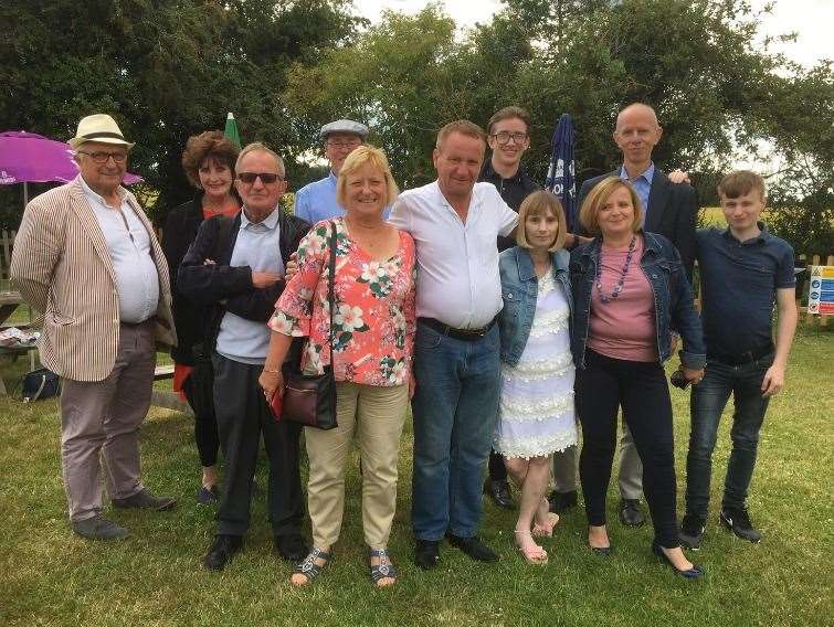 Simon with his long lost family. From front left brothers Steve and Tony, sister Christine, wife Jane and other sister Julie