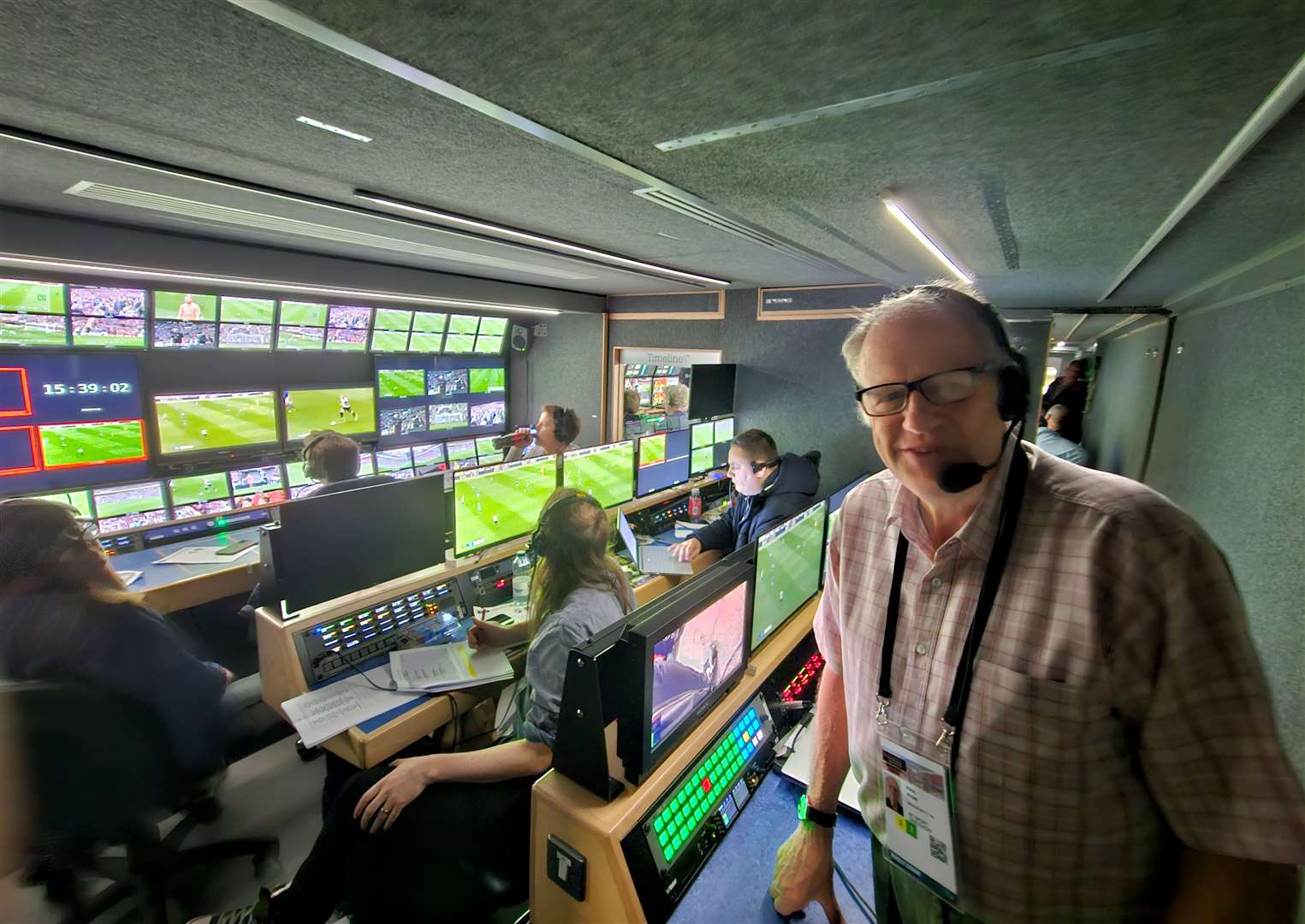 Paul Ryan, who was influential in the creation of Hawk-Eye. Pictured here working in an outside broadcast truck at Wembley for the National League Promotion Final in May