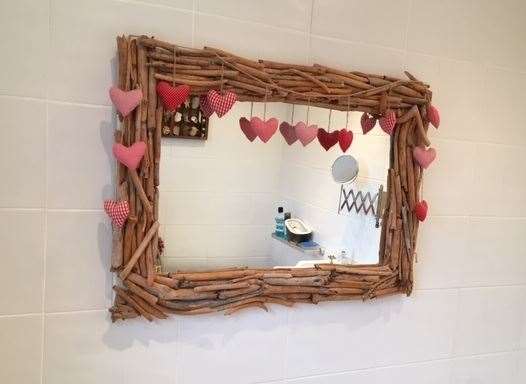 Made by her own fair hand, she’s particularly proud of the mirror, though quite why women have to add unnecessary touches is totally beyond me