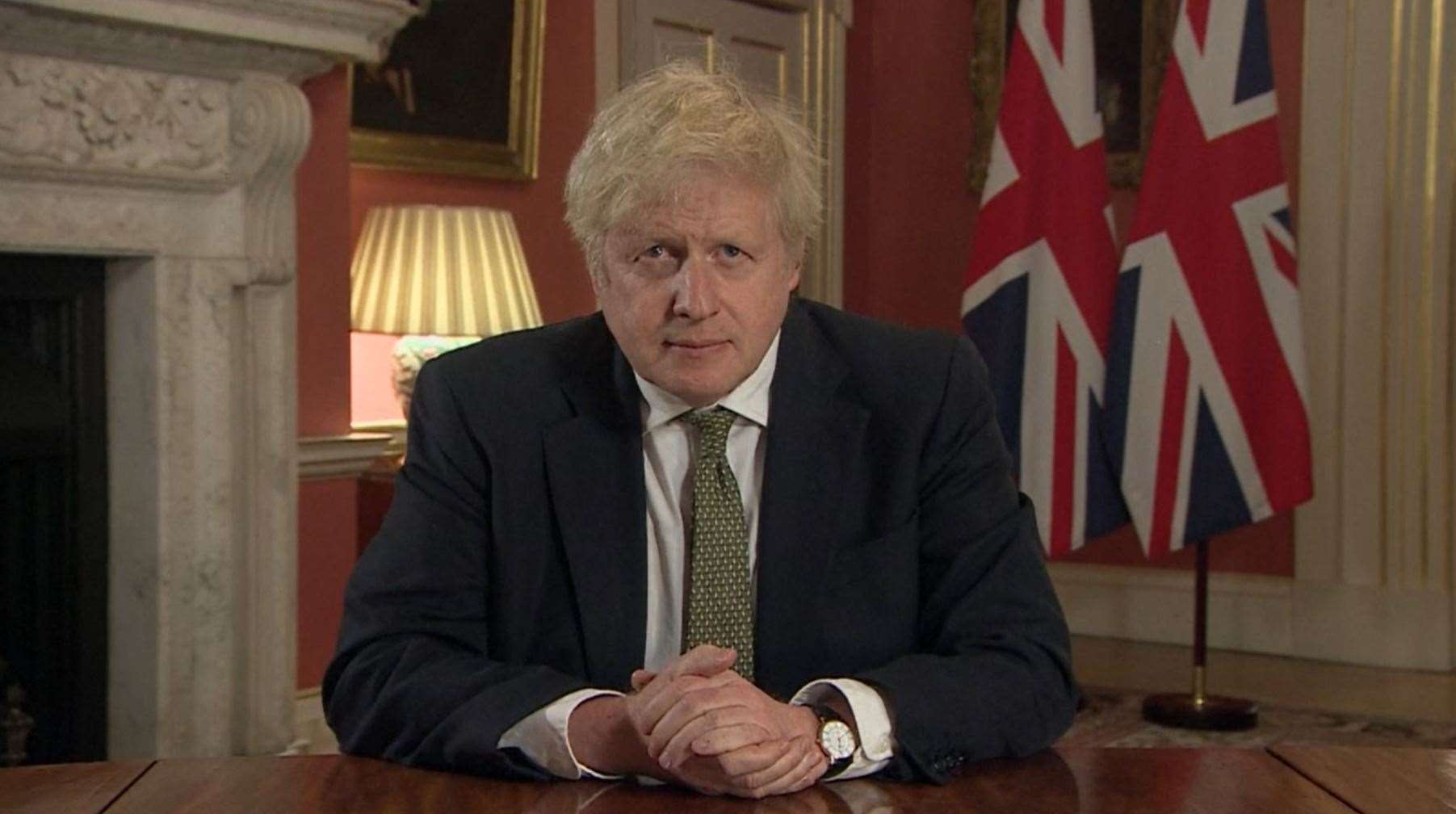 Prime Minister Boris Johnson making a televised address to the nation from 10 Downing Street setting out new emergency measures to control the spread of coronavirus in England