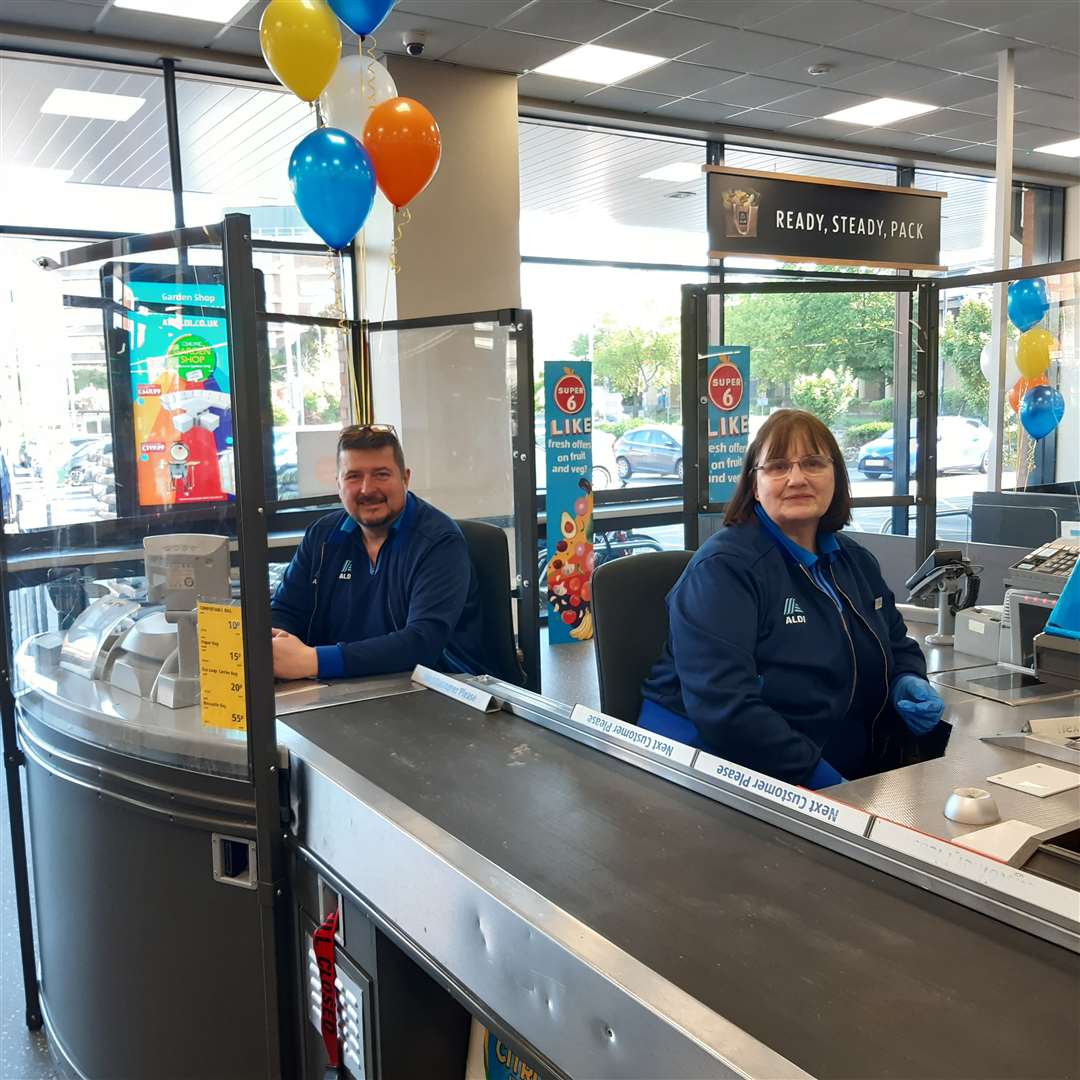 Staff ready and waiting for the first customers at Aldi in Dartford today