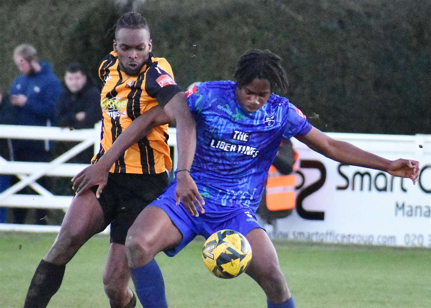 Folkestone's Ibrahim Olutade gets into a tangle in their 4-0 win over Margate. Picture: Randolph File